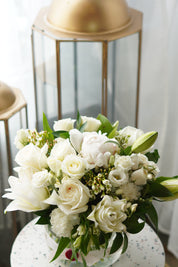 Mix White Flowers With Greenery In A Vase