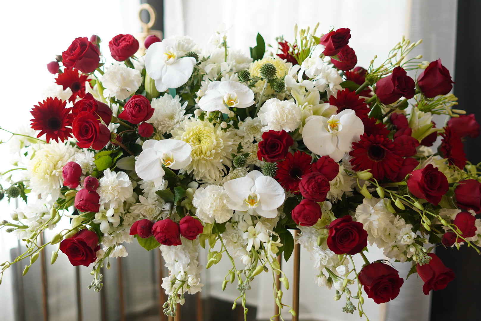 White & Red Casket Funeral Spray