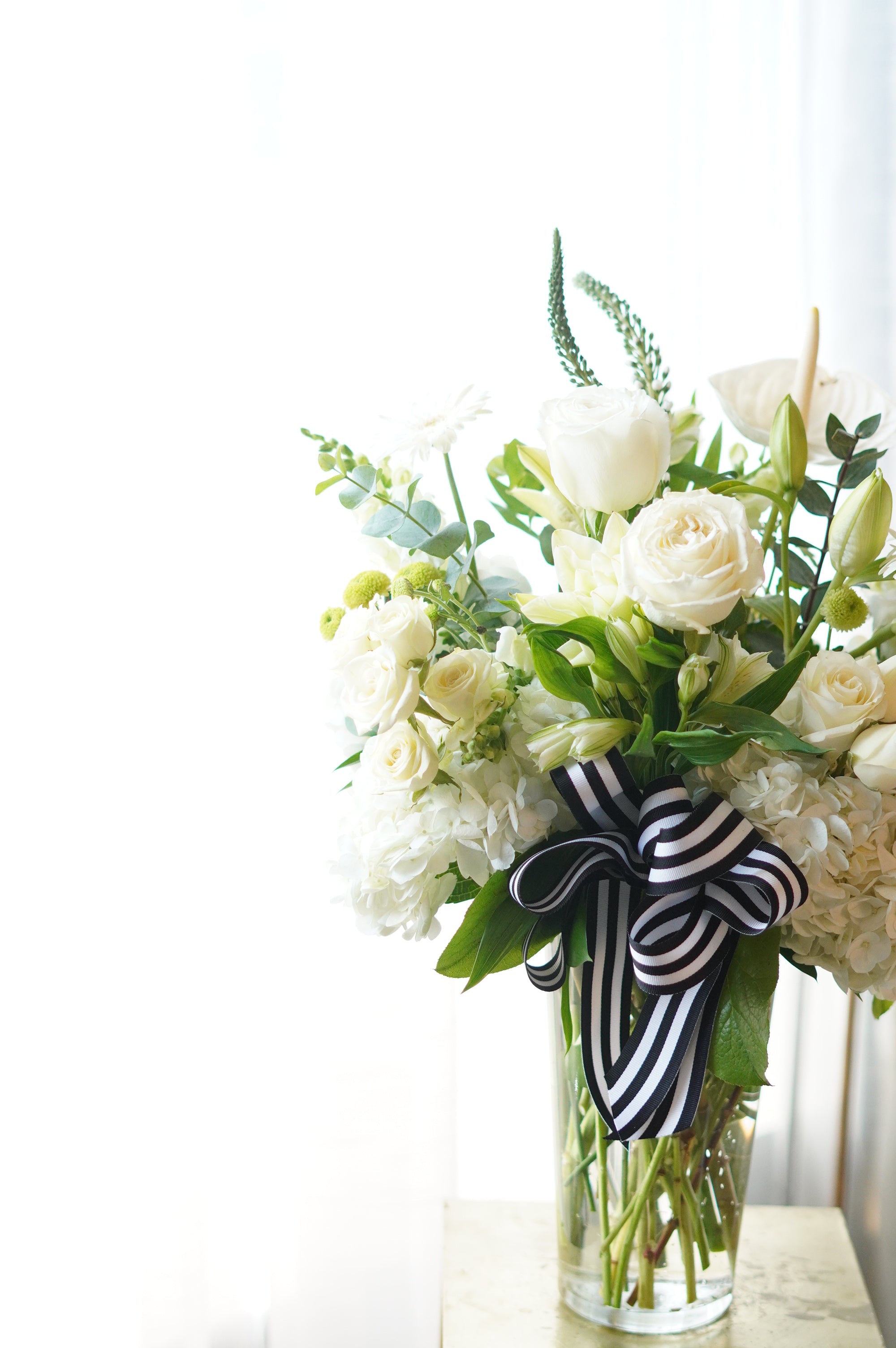 White Sympathy Flowers Vase arrangement