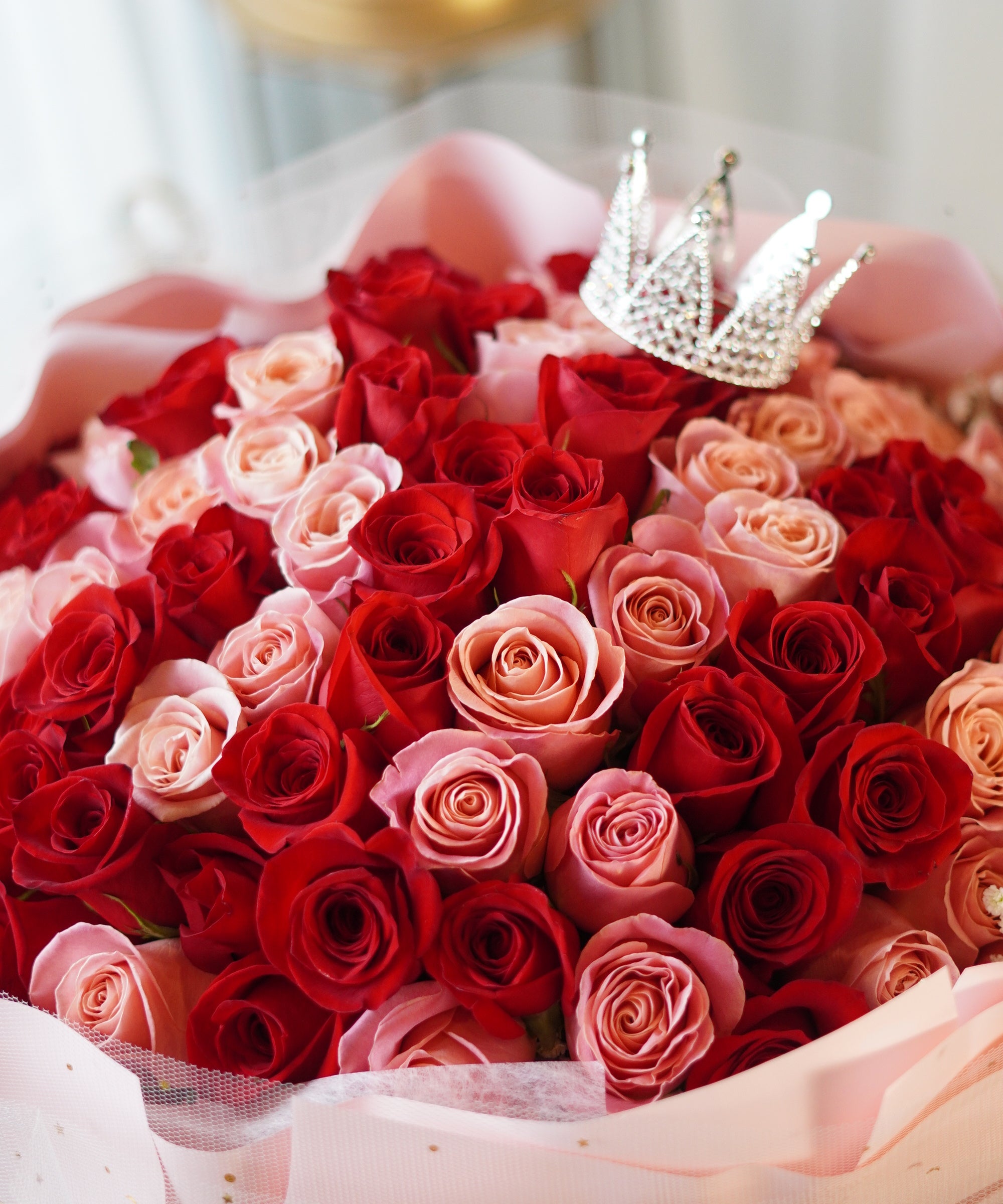 Custom 100 red and pink roses bouquet with crystal crown topper — Moon's Flowers Toronto