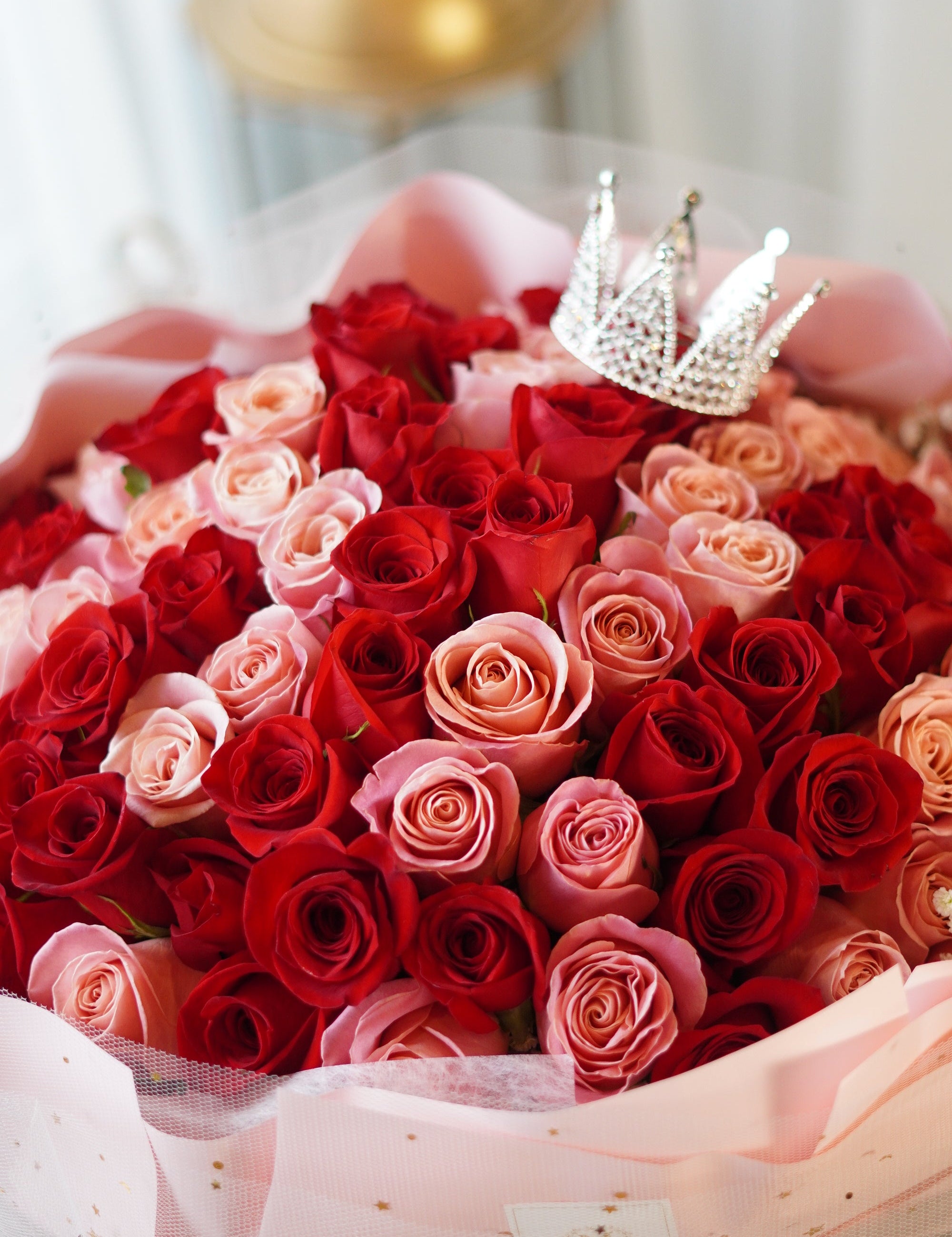 Custom 100 red and pink roses bouquet with crystal crown topper — Moon's Flowers Toronto