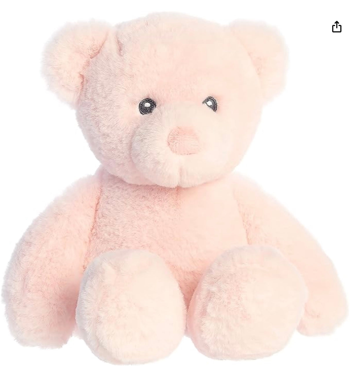 Pink teddy bear on a white background