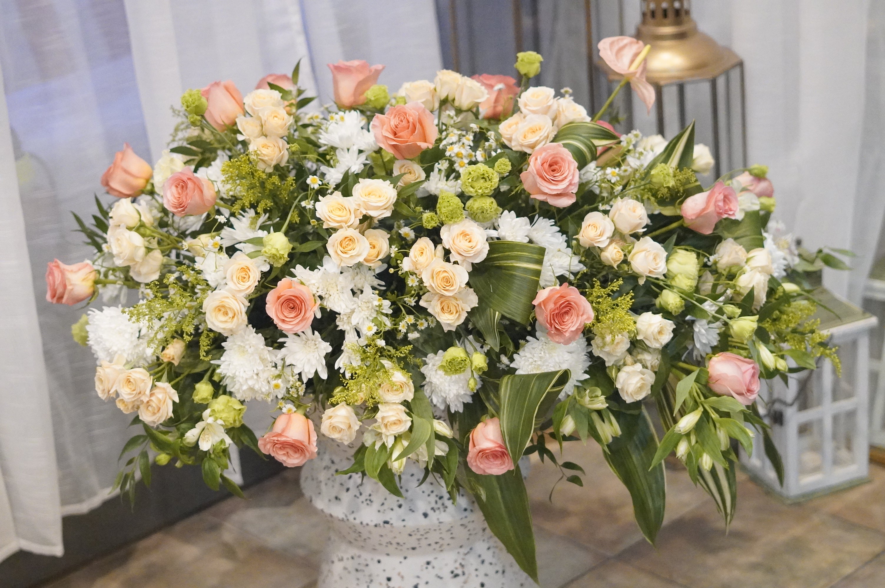 A front-facing photo that is clearly visible from the front when placed on the casket.casket spray,Funeral & Sympathy Flowers Toronto