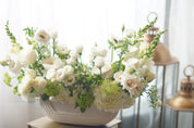white sympathy flower arrangement in ceramic vase Toronto delivery