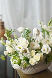 modern white floral centerpiece sympathy flowers Oakville florist