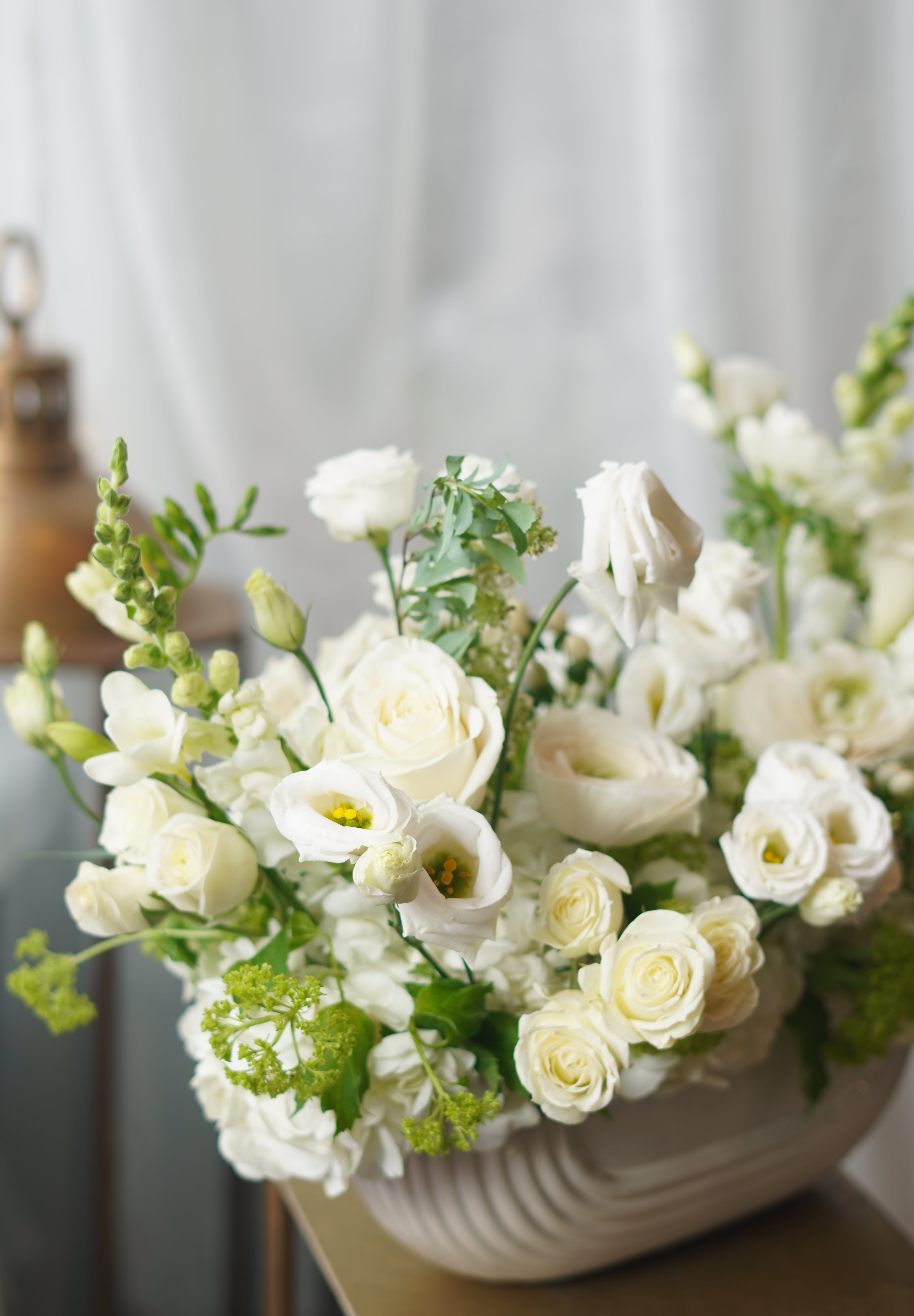 modern white floral centerpiece sympathy flowers Oakville florist