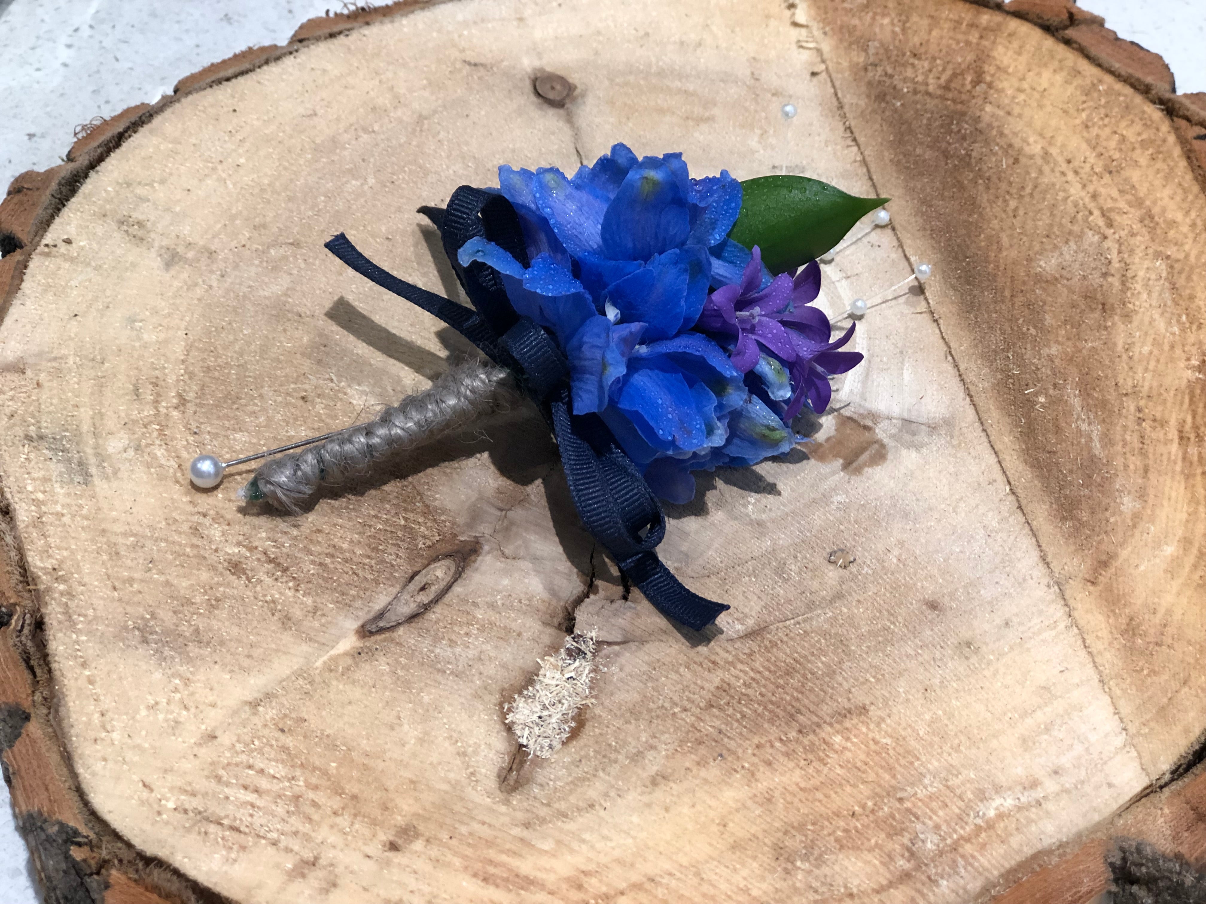 natural style boutonniere blue flowers groom wedding accessory