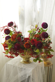 Full autumn flower arrangement in a sculptural gold urn — GTA flower delivery