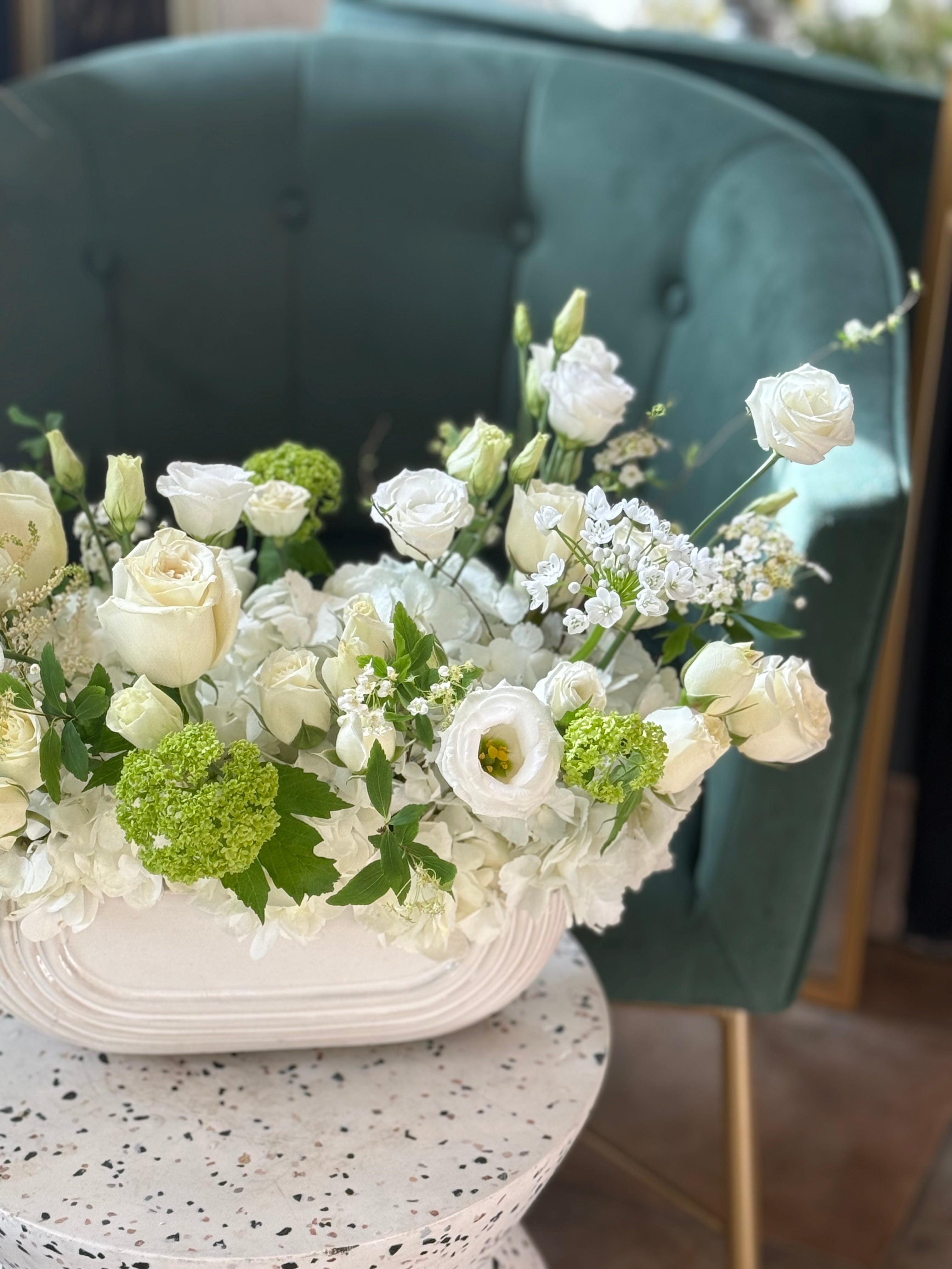 Closeup shot of the flowers in A Walk to Remember. Sympathy and Funeral Flowers