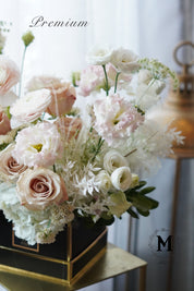 A romantic arrangement of pink and white flowers in a glass vase. Hand-delivered fresh to Mississauga, Brampton, and Toronto by Moon's Flowers.