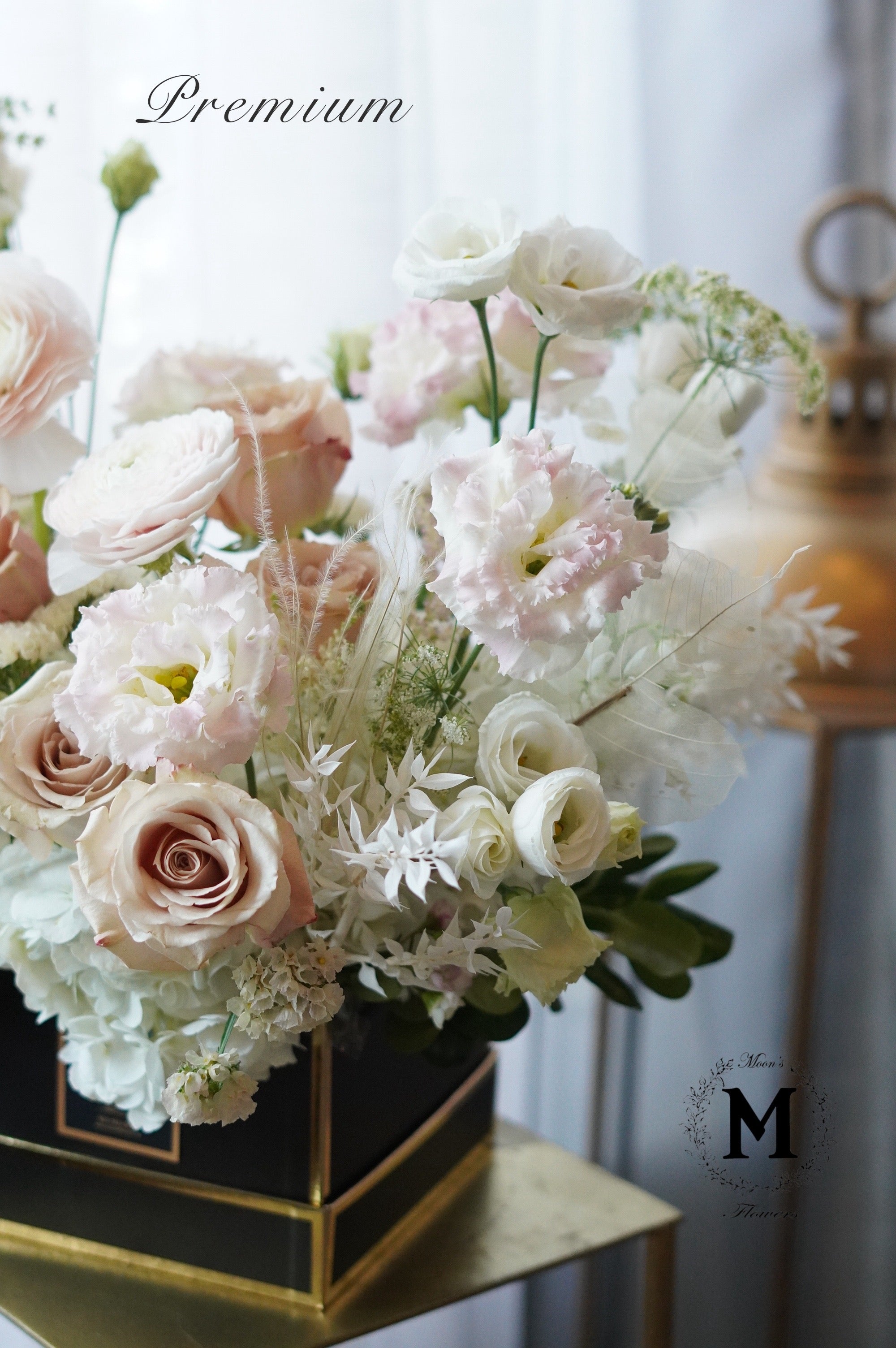 A romantic arrangement of pink and white flowers in a glass vase. Hand-delivered fresh to Mississauga, Brampton, and Toronto by Moon's Flowers.