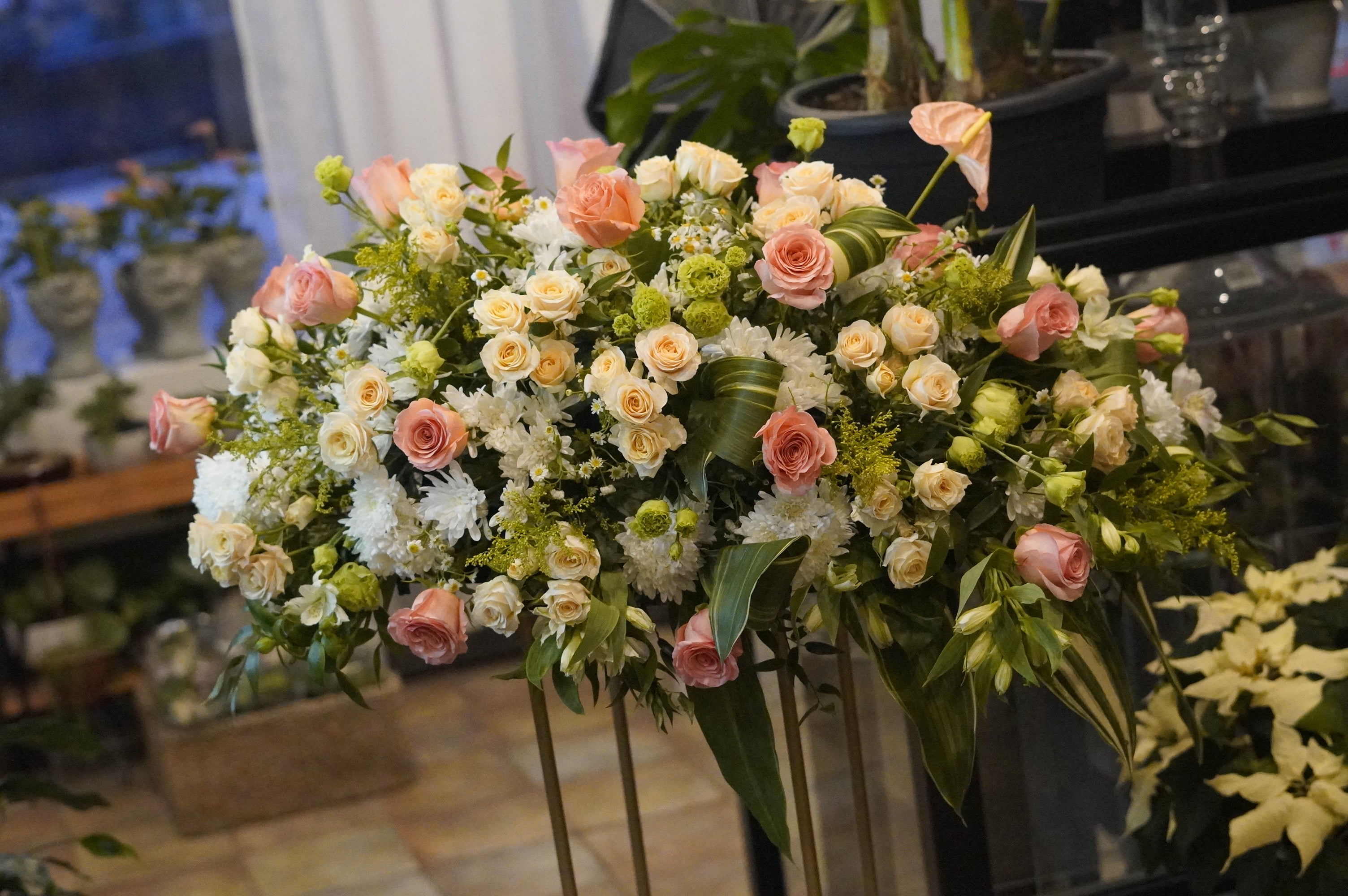 A front-facing photo that is clearly visible from the front when placed on the casket.casket spray,Funeral & Sympathy Flowers Toronto