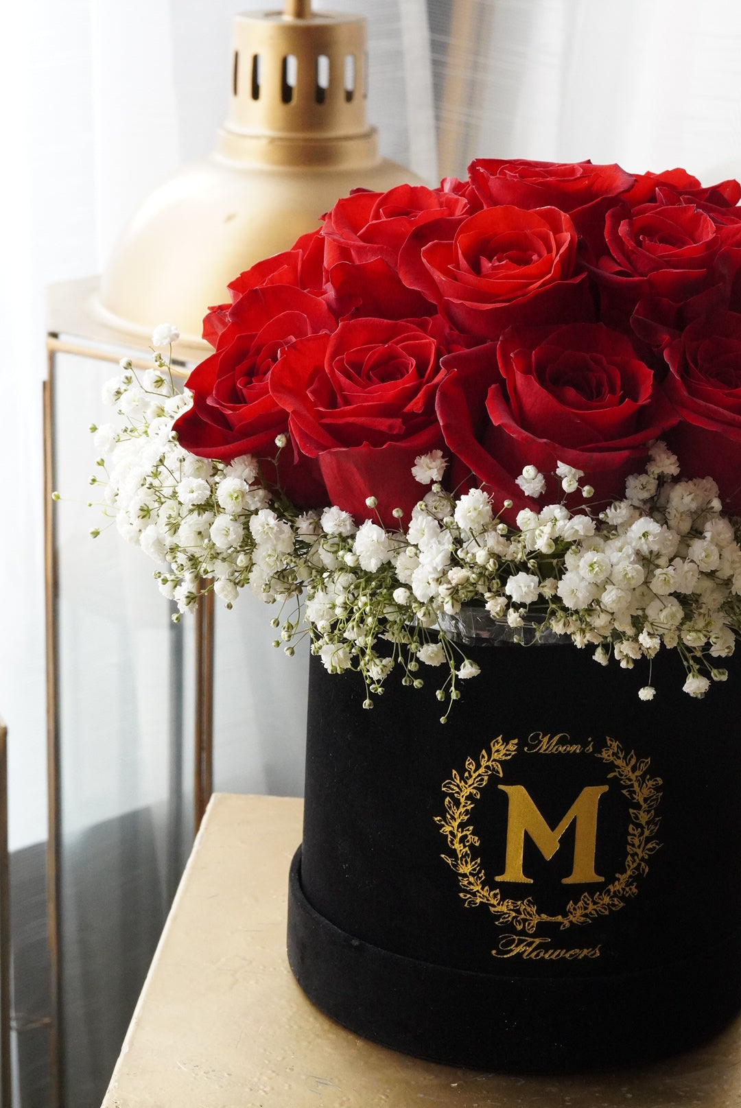 15 rose box arrangement with baby’s breath styled in Moon’s Flowers’ signature box