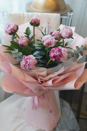 pink peony bouquet wrapped in soft pink paper toronto