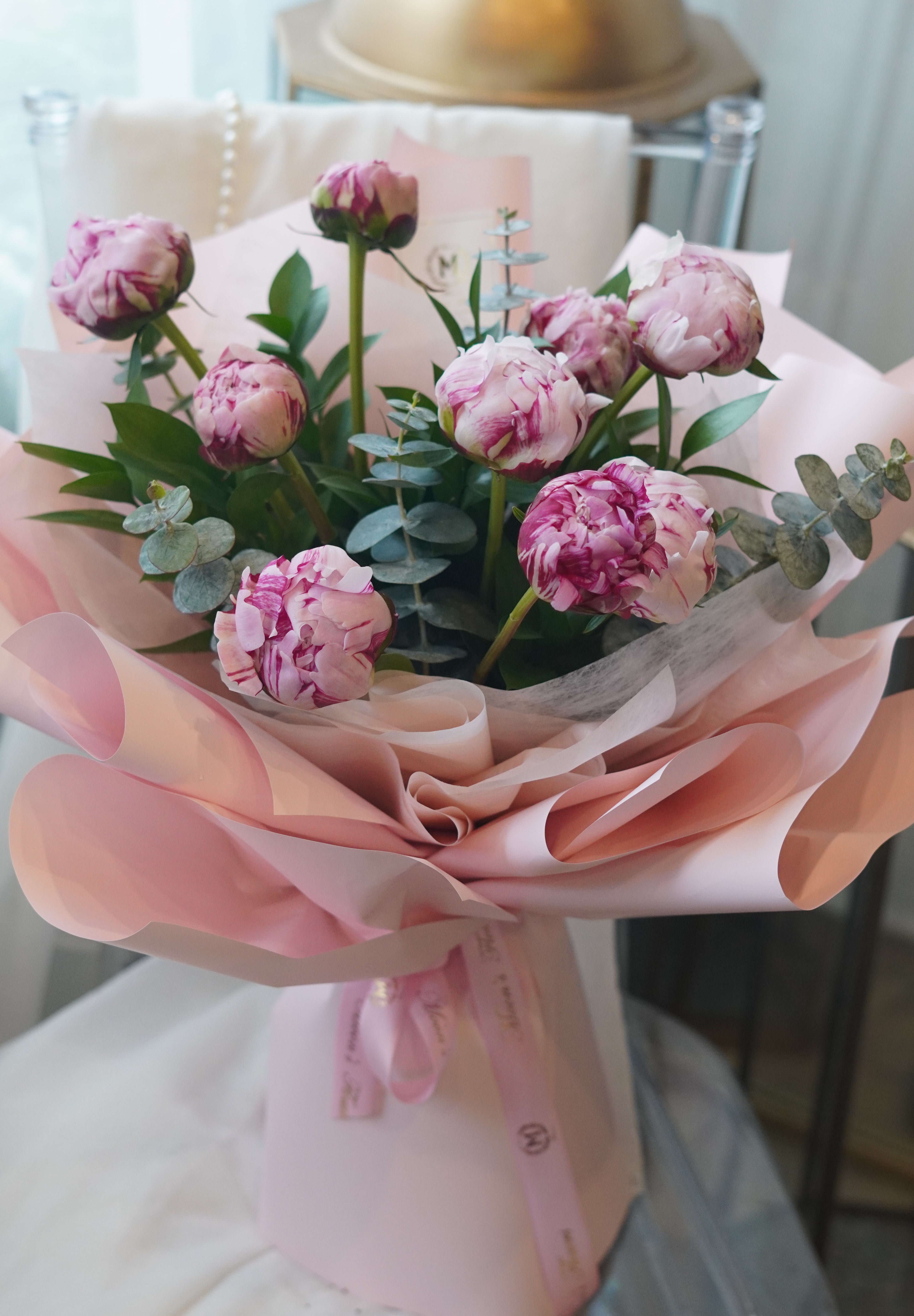 pink peony bouquet wrapped in soft pink paper toronto