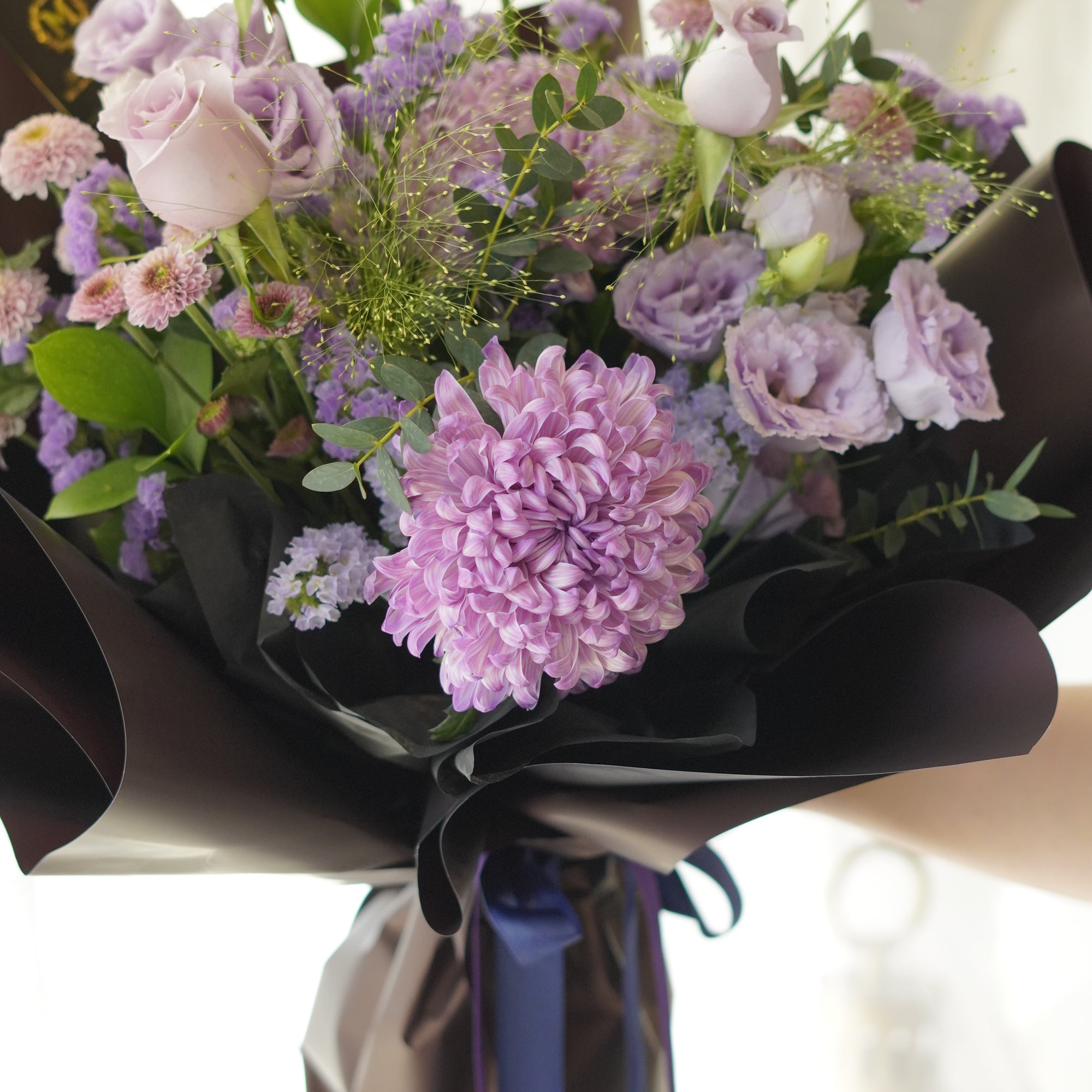 Custom purple flower bouquet with lavender roses and violet lisianthus designed for BTS ARMY fan celebrations in Oakville and GTA