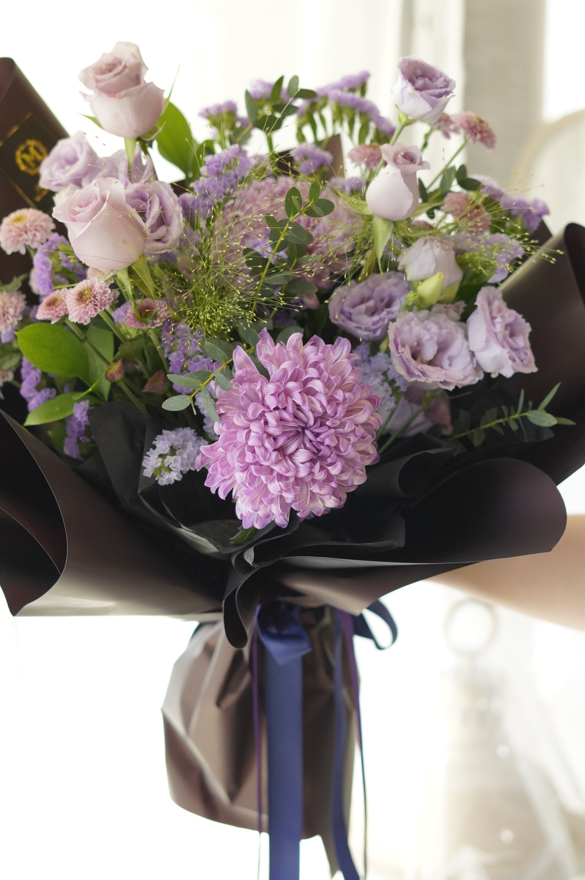 Custom purple flower bouquet with lavender roses and violet lisianthus designed for BTS ARMY fan celebrations in Oakville and GTA