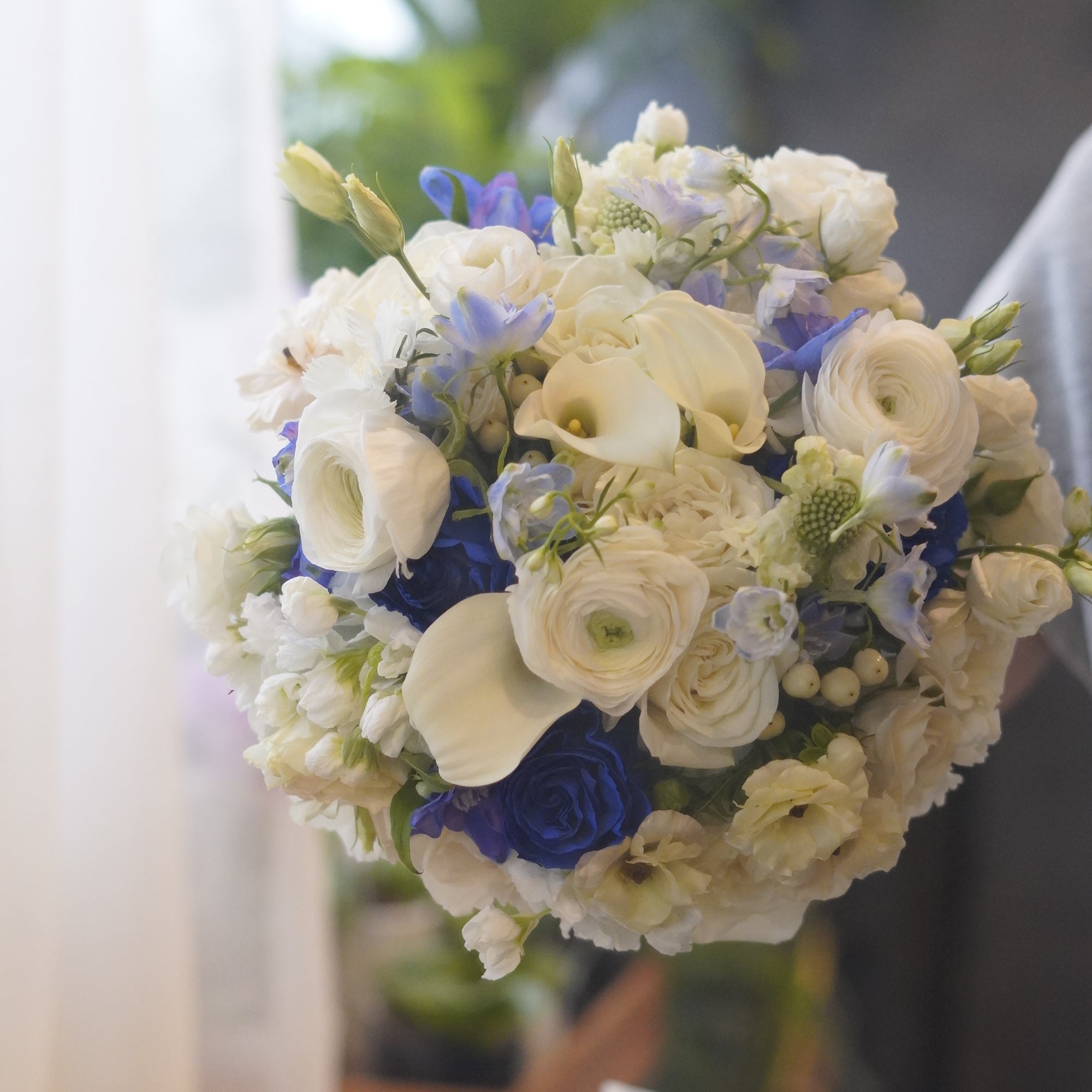 Blue and white flower bouquet with white roses and seasonal flowers, Toronto florist