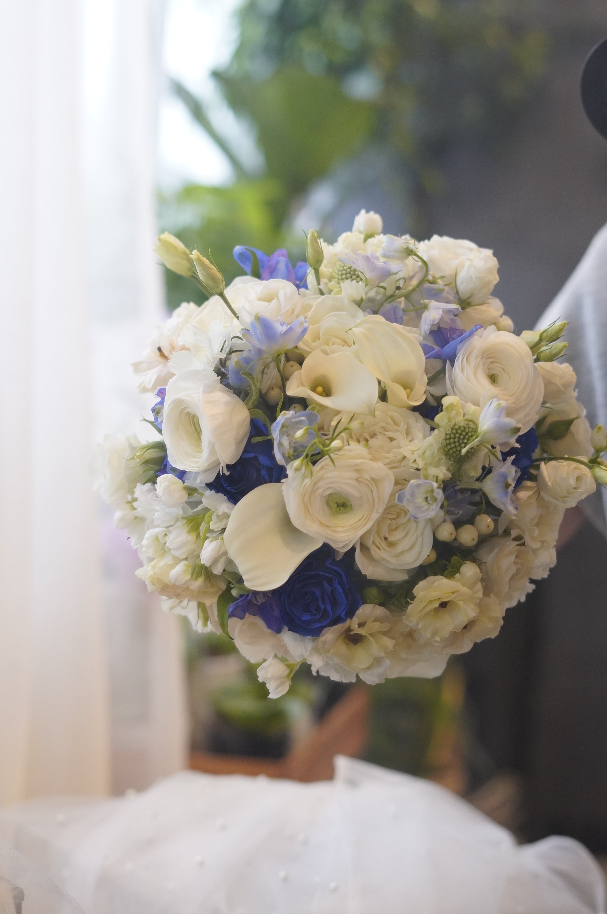 Blue and white flower bouquet with white roses and seasonal flowers, Toronto florist