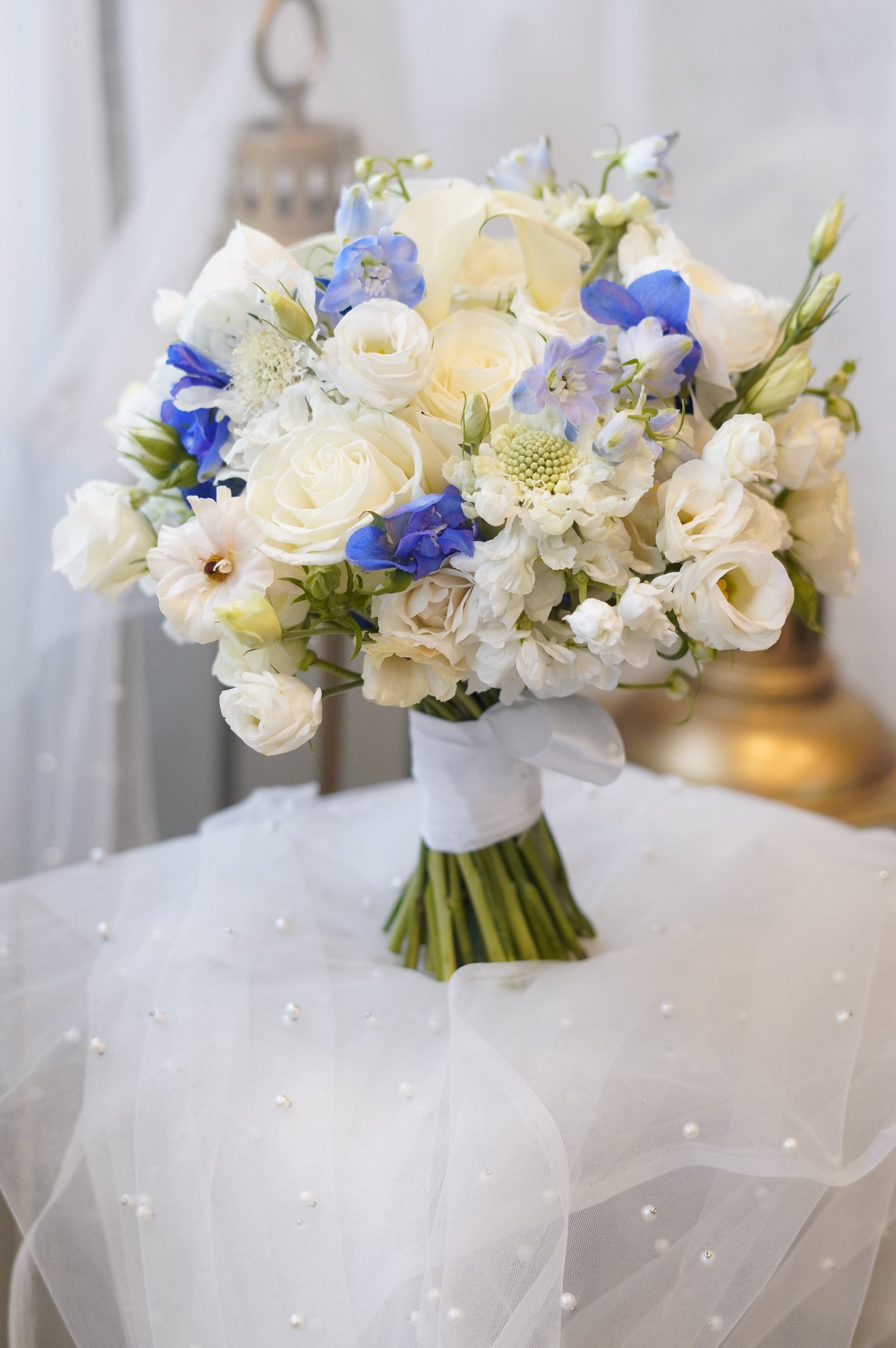 Blue and white flower bouquet with white roses and seasonal flowers, Toronto florist