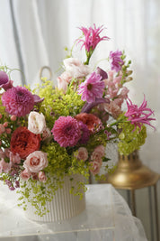 Pink dahlias and coral garden roses in lush garden-style arrangement — Toronto florist Moon's Flowers