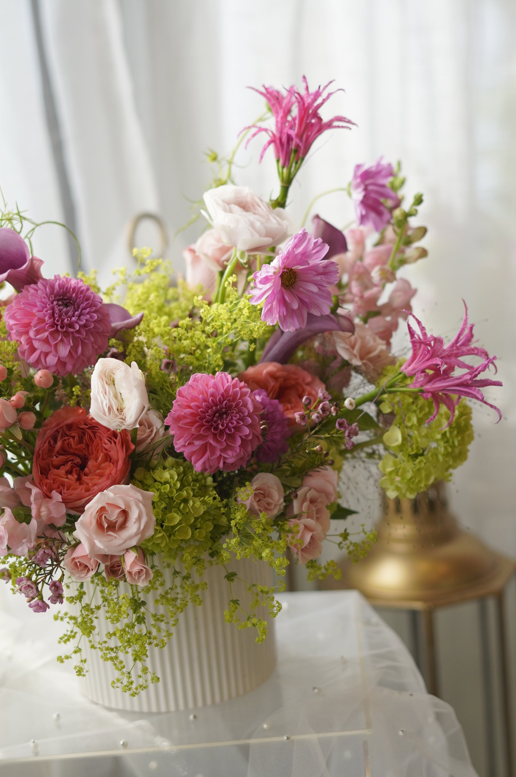 Pink dahlias and coral garden roses in lush garden-style arrangement — Toronto florist Moon's Flowers