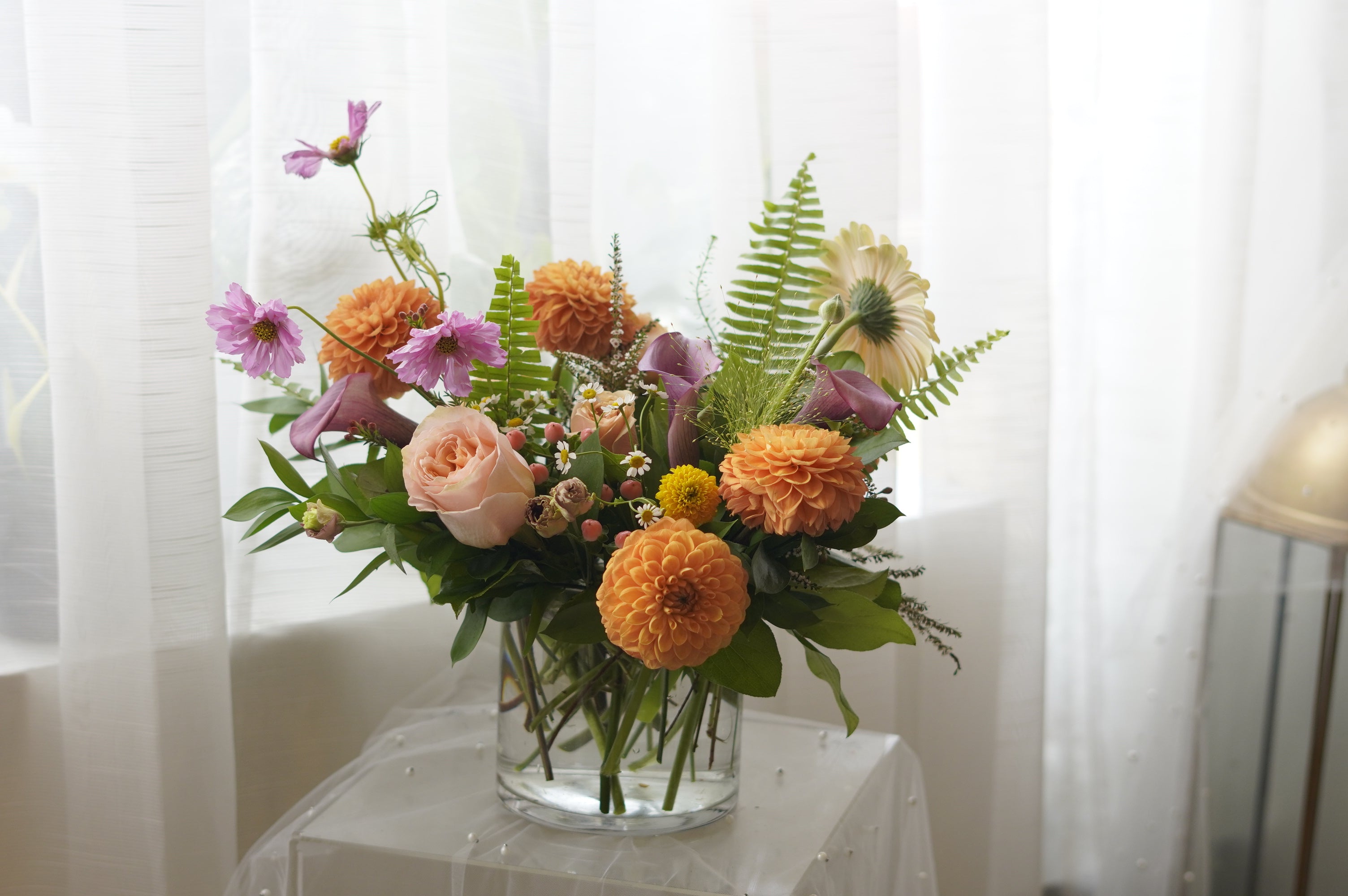 Orange dahlias, blush roses and cosmos floral arrangement — Oakville florist delivery