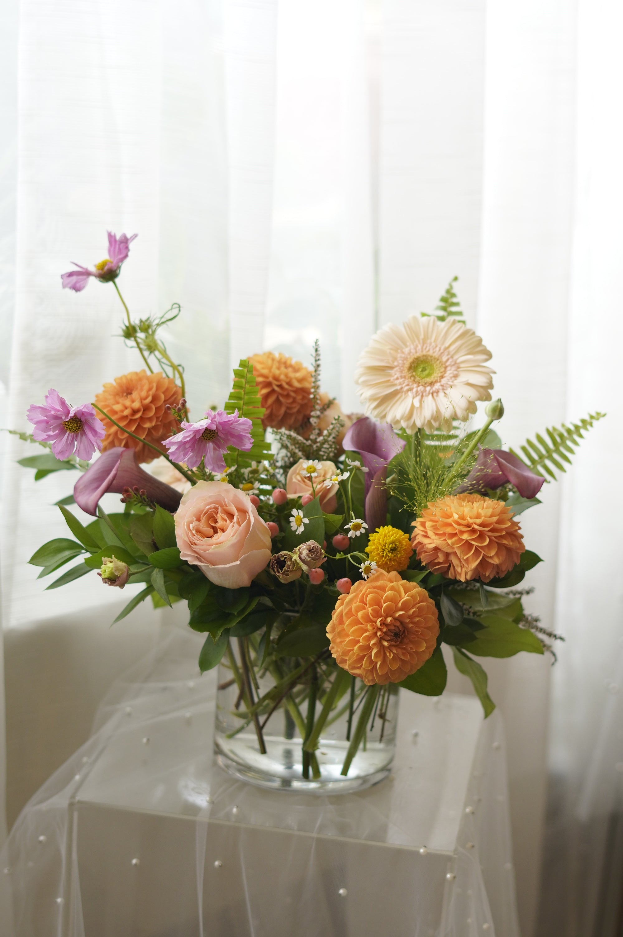 Orange dahlias, blush roses and cosmos floral arrangement — Oakville florist delivery