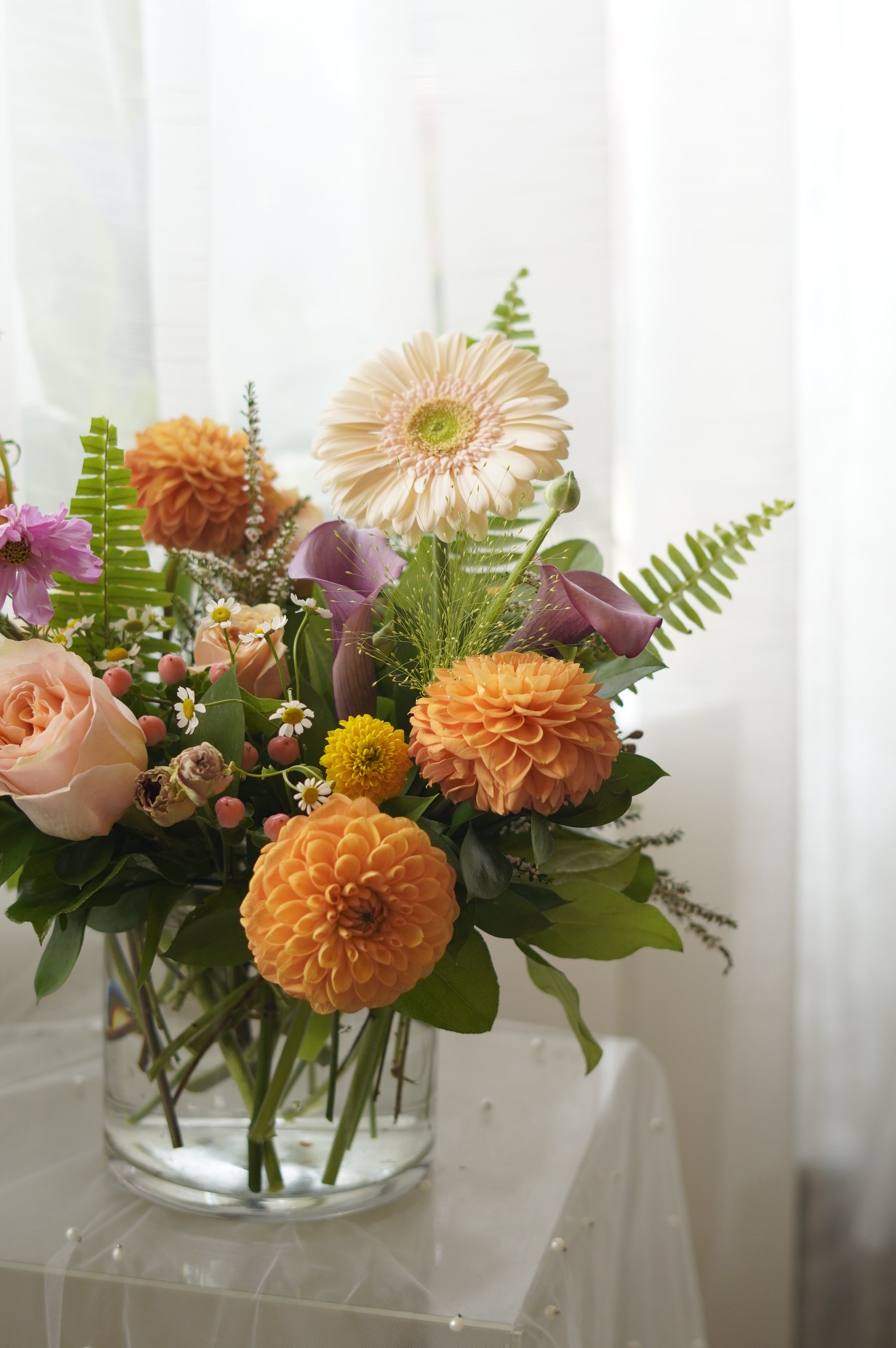 Orange dahlias, blush roses and cosmos floral arrangement — Oakville florist delivery