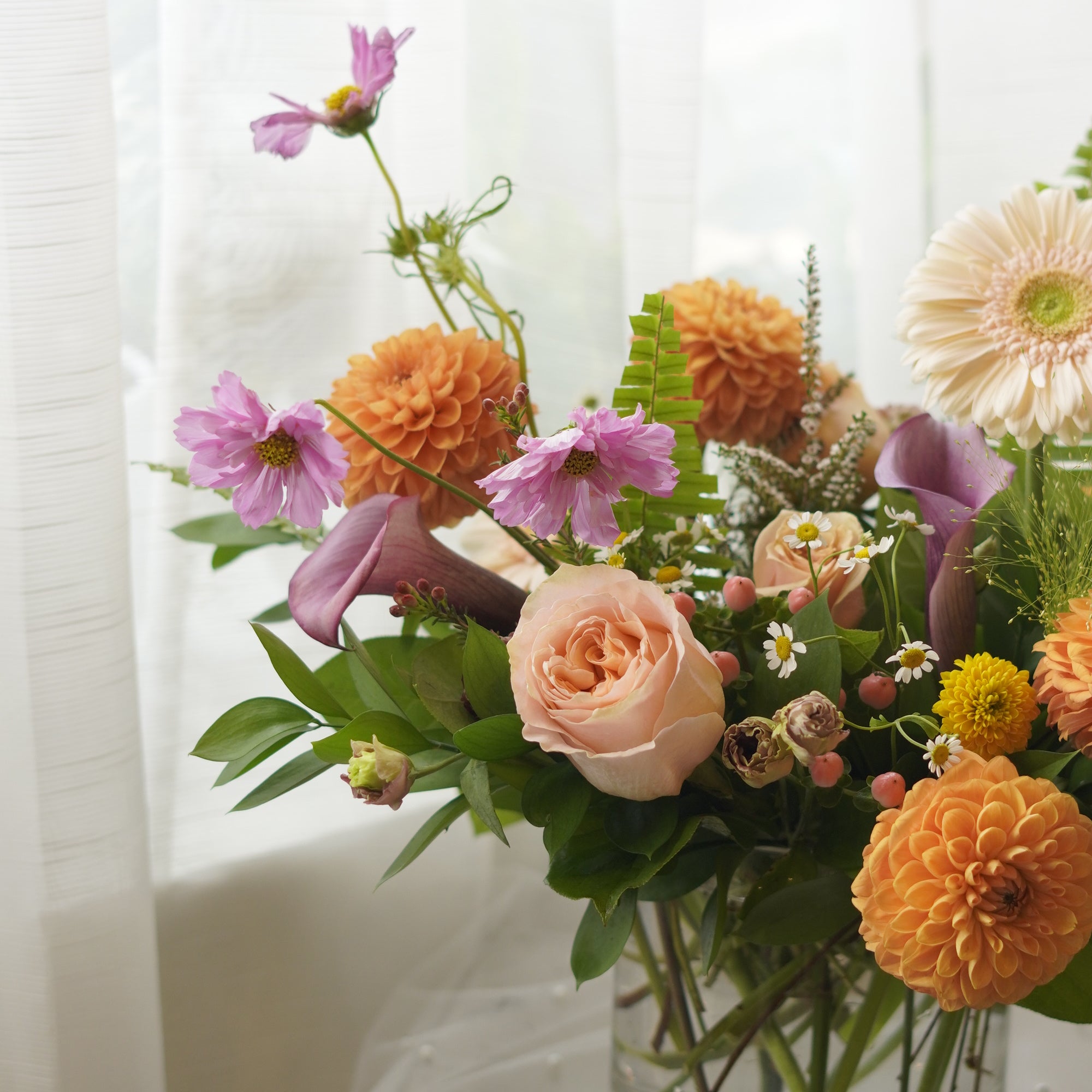 Orange dahlias, blush roses and cosmos floral arrangement — Oakville florist delivery