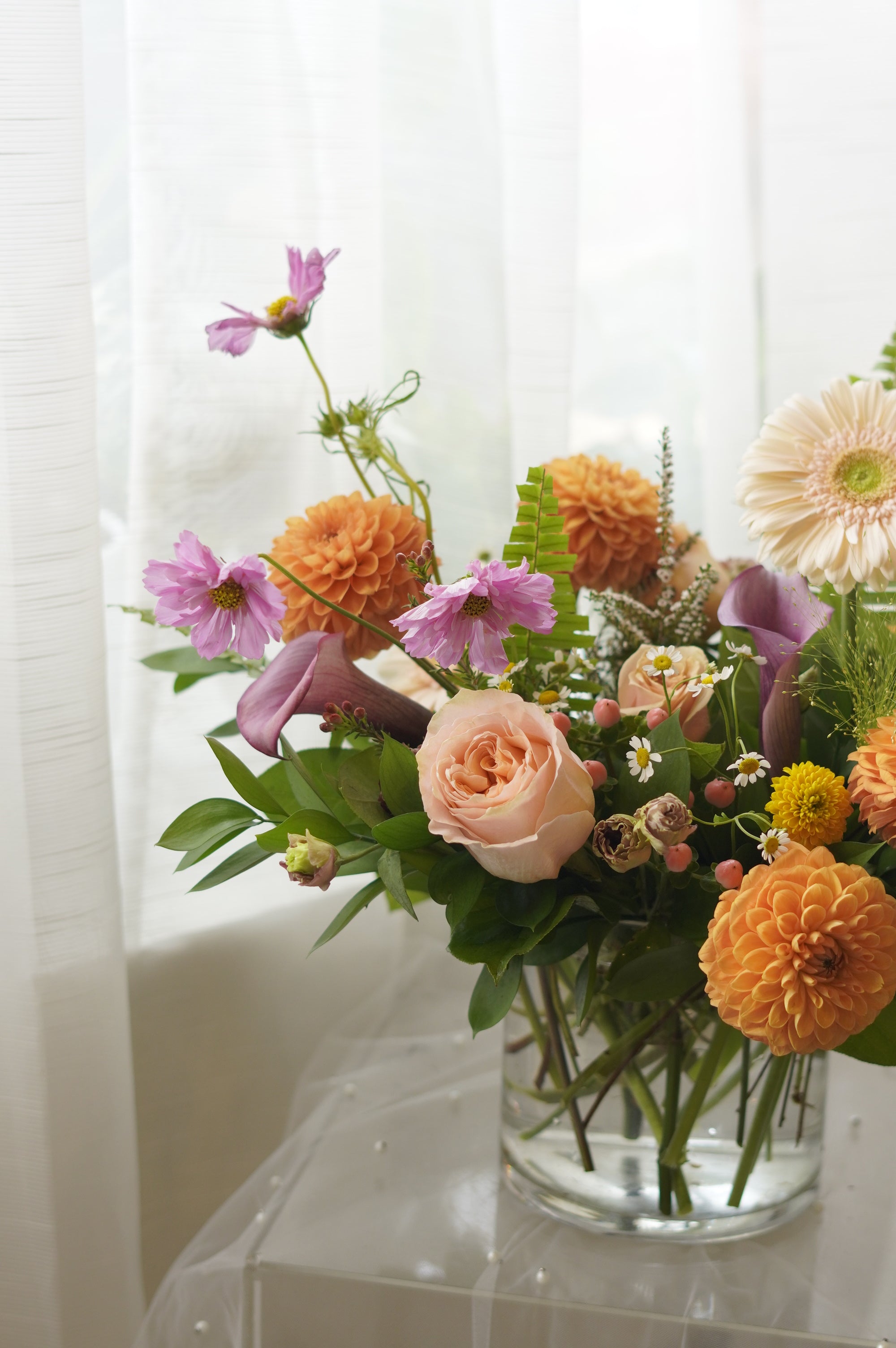 Orange dahlias, blush roses and cosmos floral arrangement — Oakville florist delivery