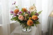 Orange dahlias, blush roses and cosmos floral arrangement — Oakville florist delivery
