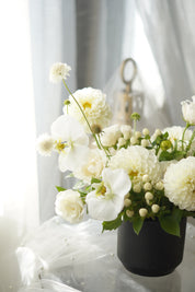 Ivory Dahlia Garden Arrangement in black ribbed vase — same-day flower delivery Toronto