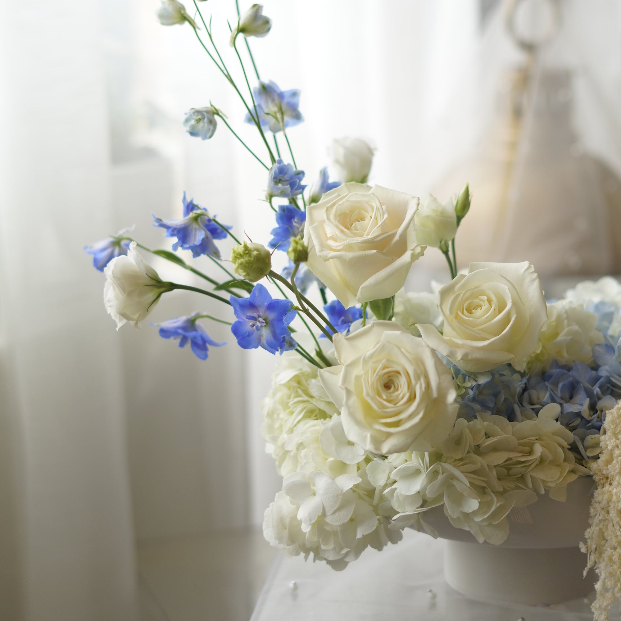 Blue Serenity Flower Arrangement in low bowl — Same-day flower delivery Toronto GTA"