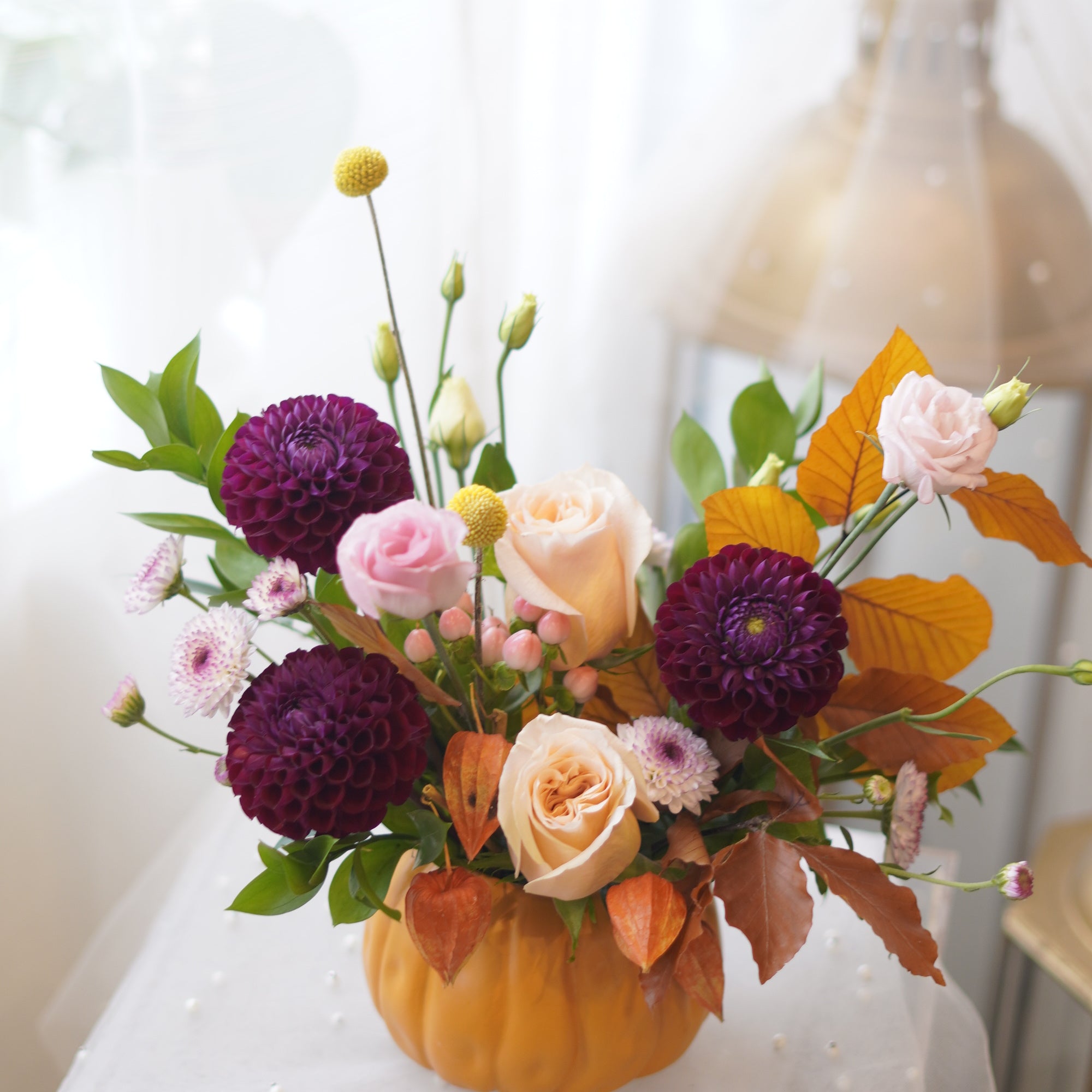 Burgundy Dahlias & Peach Roses in Pumpkin Vase — Fall Arrangement Toronto