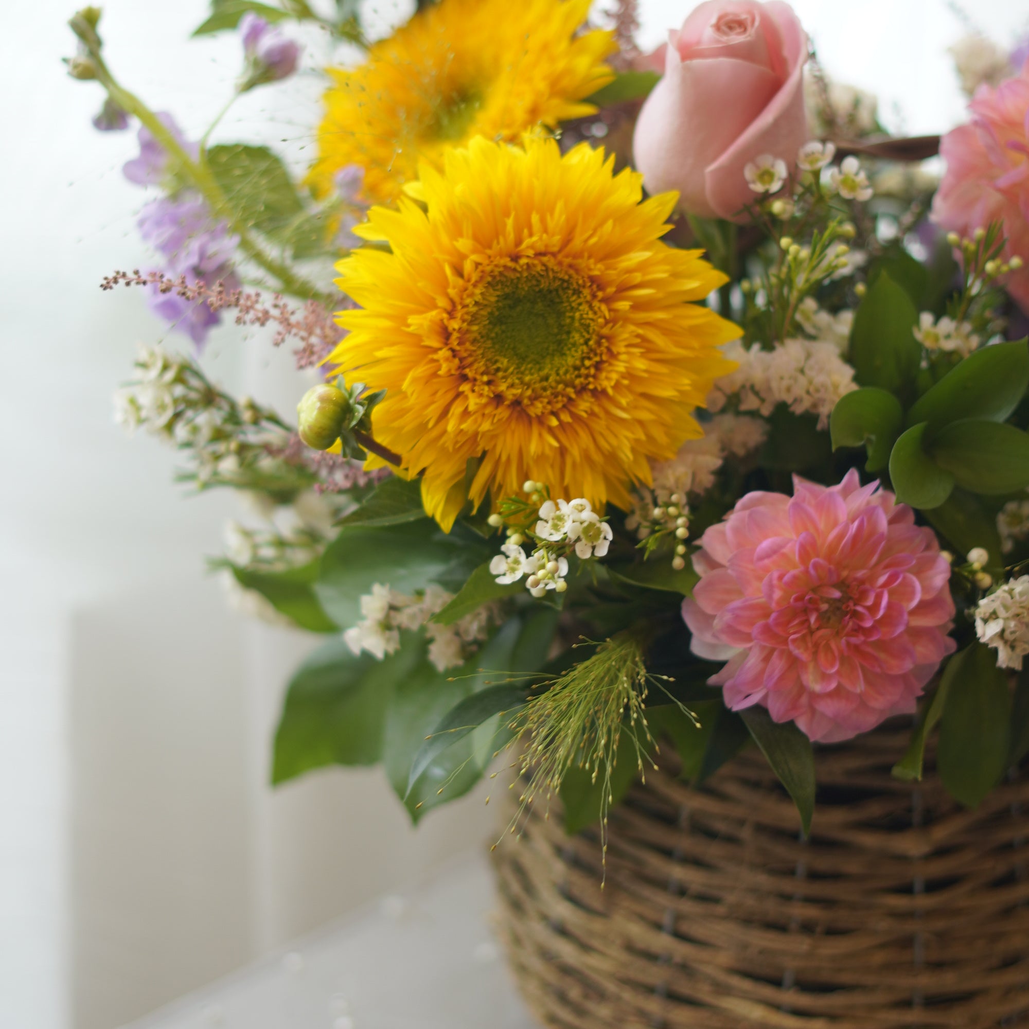 Meadow Glow Basket Arrangement in Wicker Basket — Same-Day Flower Delivery Toronto & GTA
