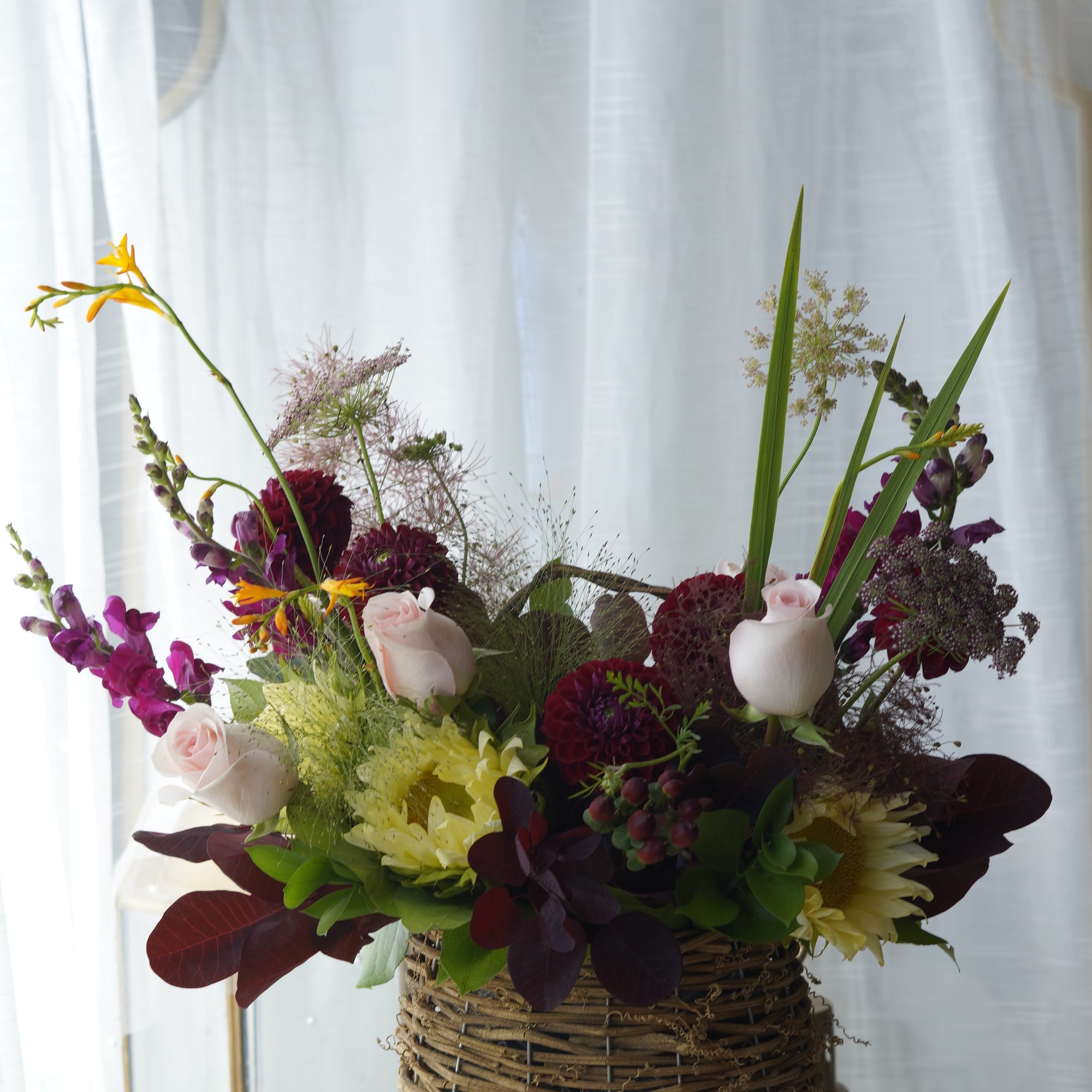Meadow Glow Basket Arrangement in Wicker Basket — Same-Day Flower Delivery Toronto & GTA