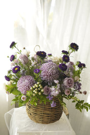 Lavender Muse arrangement in woven basket — Toronto flower delivery