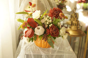 Golden Harvest arrangement in a real pumpkin — autumn flower delivery Toronto