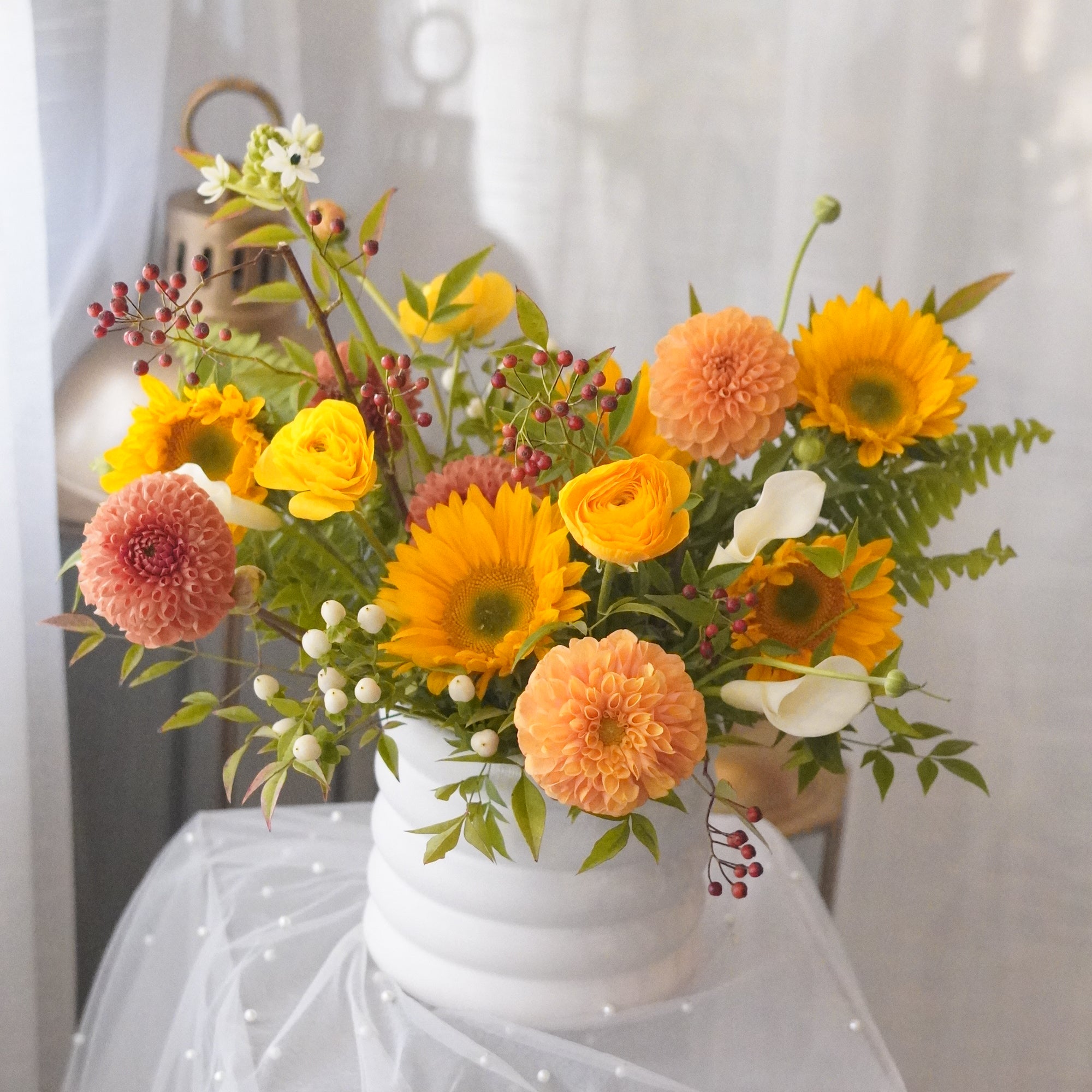 Golden Gathering in a white sculptural vase — Thanksgiving flower delivery in Toronto and Oakville