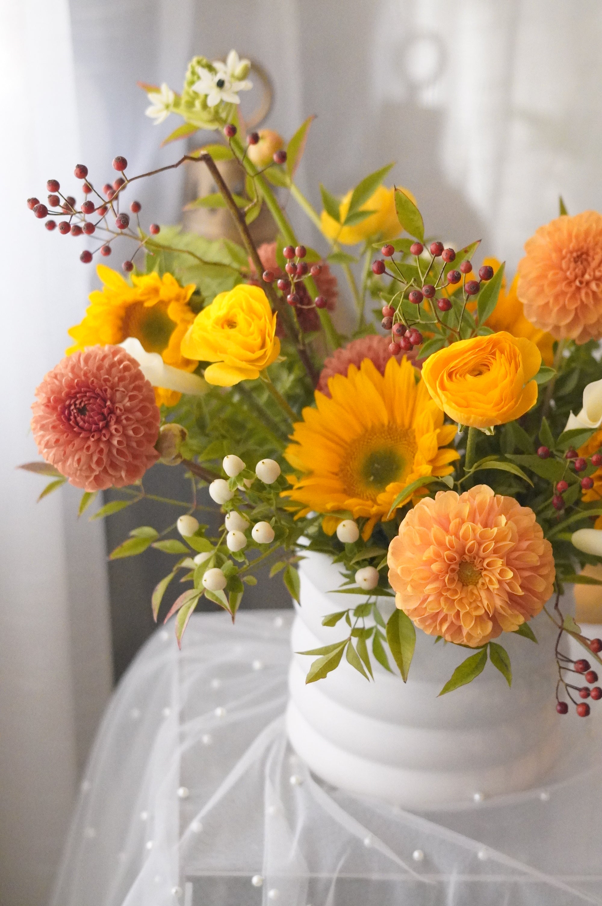 Sunflowers, peach dahlias, and yellow ranunculus — Toronto and Oakville autumn flowers