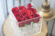 Crystal Rose Box featuring premium red roses arranged in a clear acrylic box
