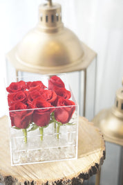 red rose acrylic box arrangement styled as an elegant home decor piece