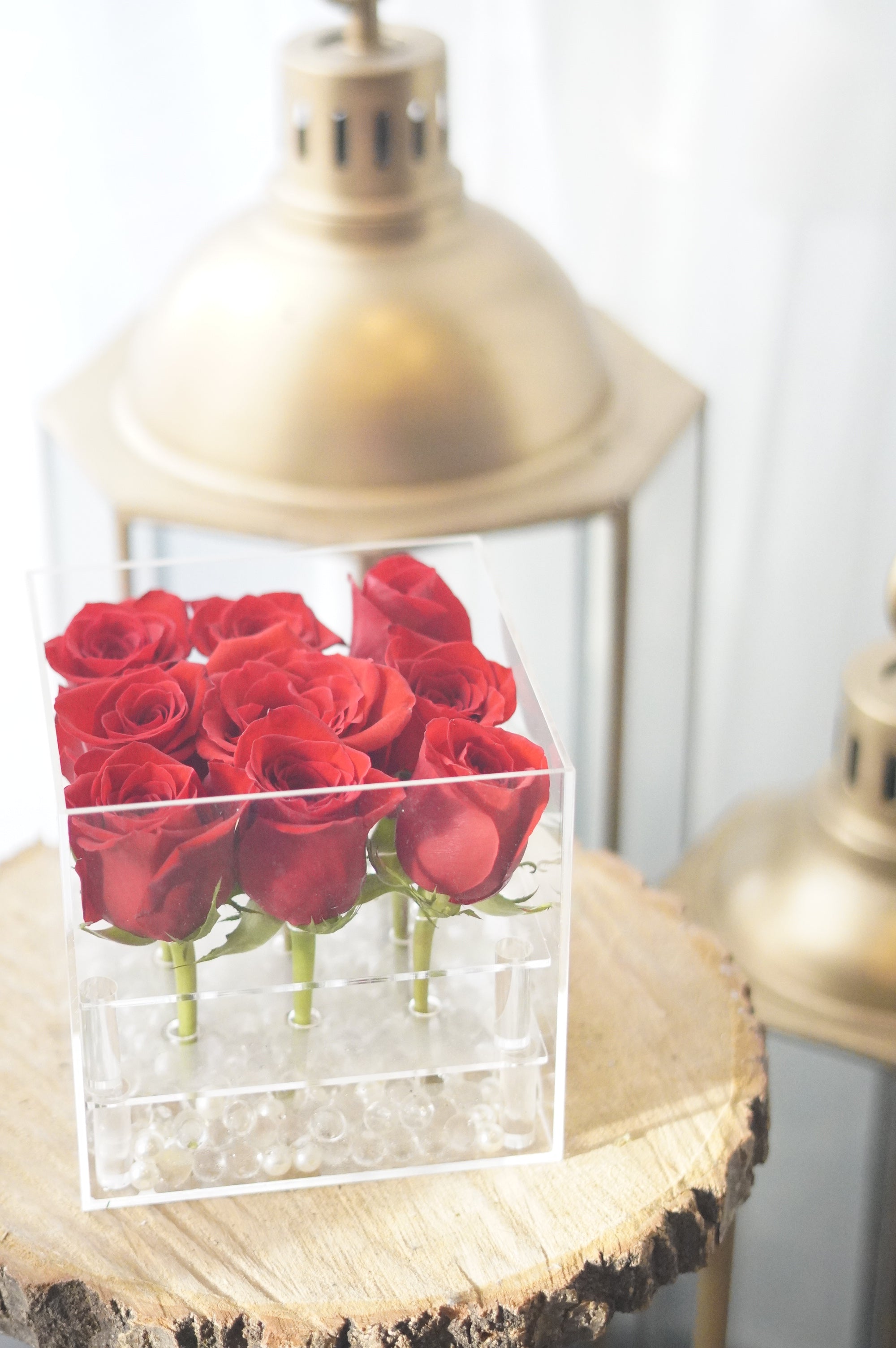 red rose acrylic box arrangement styled as an elegant home decor piece