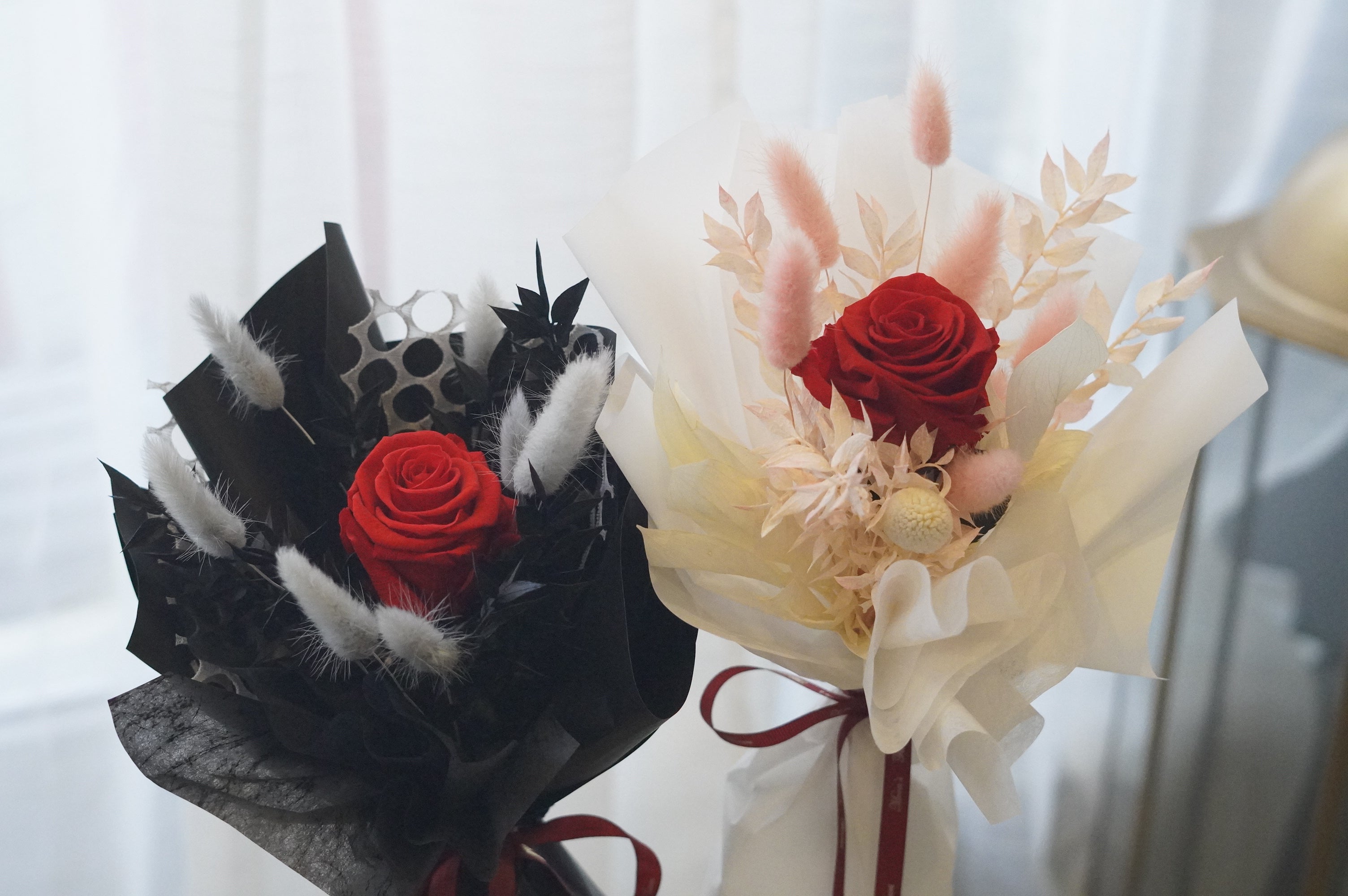 Single long stem preserved roses in white and black signature wrapping, luxury preserved rose gift by Moon’s Flowers
