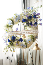 Elegant blue rose memorial wreath for funeral services in Oakville and Mississauga.