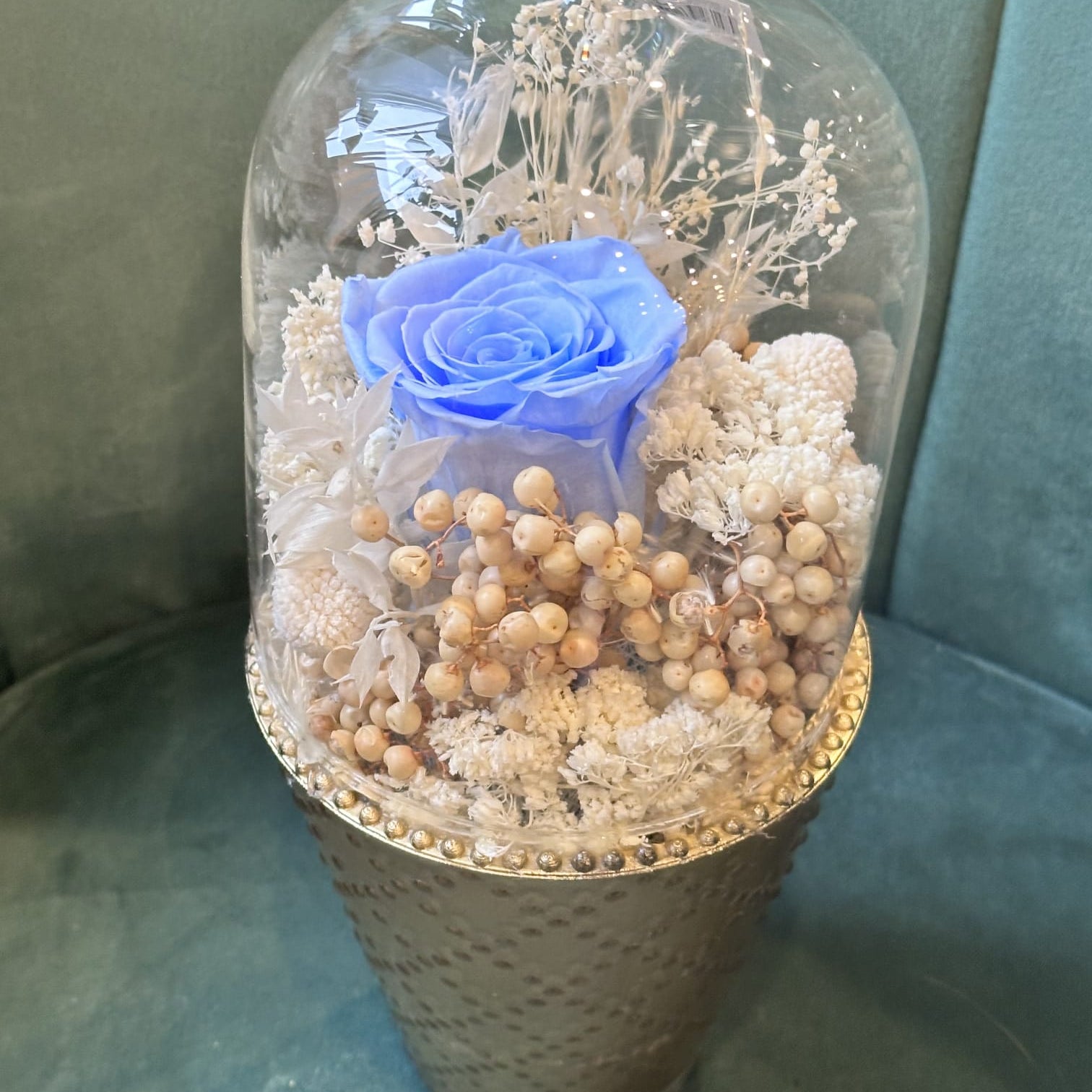 Eternal Rose Elegance is a preserved flower arranged with white preserved flowers in a brass container.