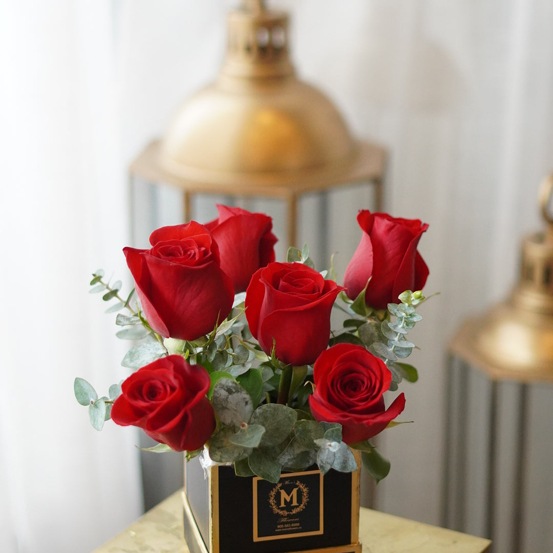 half dozen rose box arranged in an elegant box design