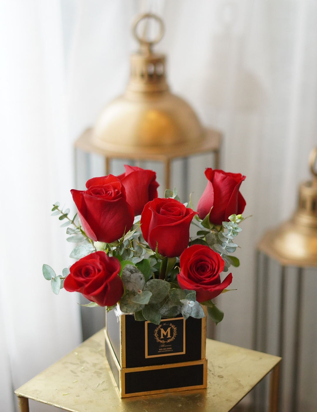 half dozen rose box arranged in an elegant box design