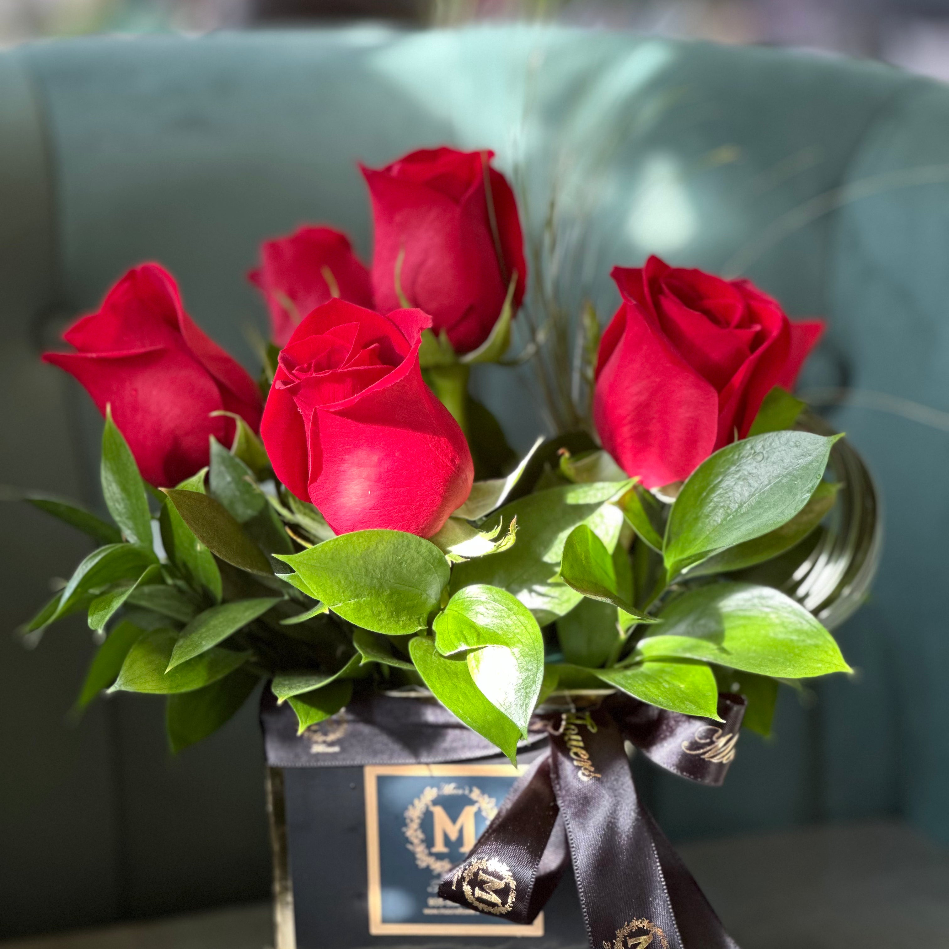 Half dozen rose box designed to function as a vase for easy display